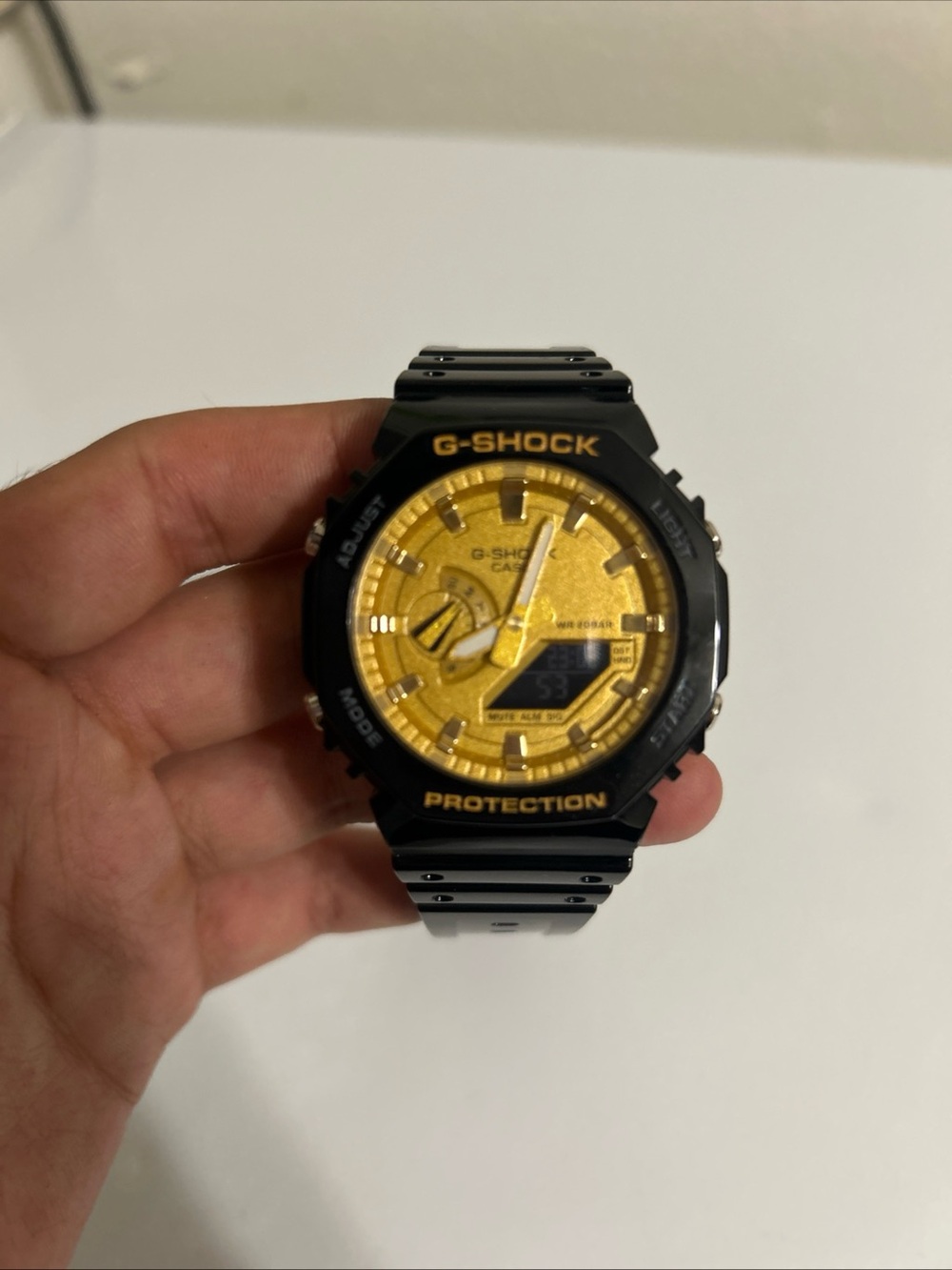 G-Shock Black Resin Watch with Gold Dial